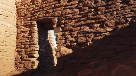 looking through ancient doorway of wukoki tower at wukoki pueblo