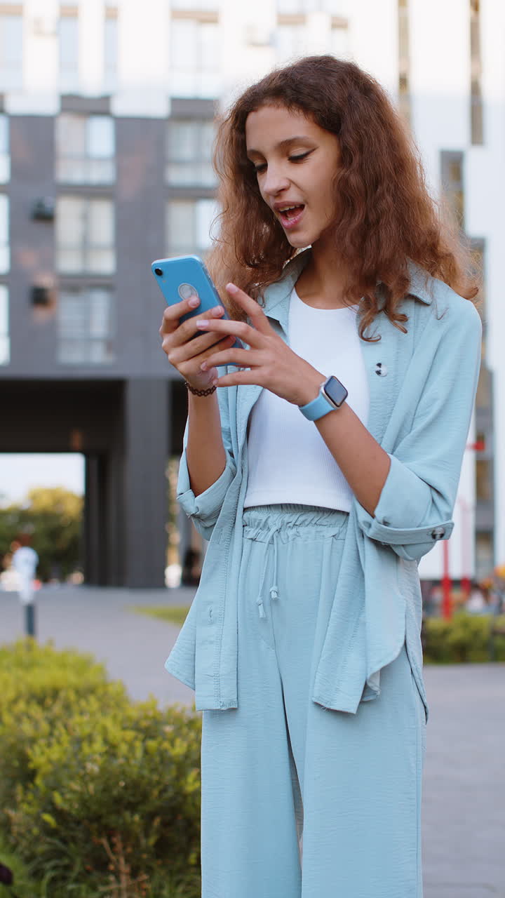 Tourist traveler teen child girl use looking smartphone search a way on map in mobile navigator app