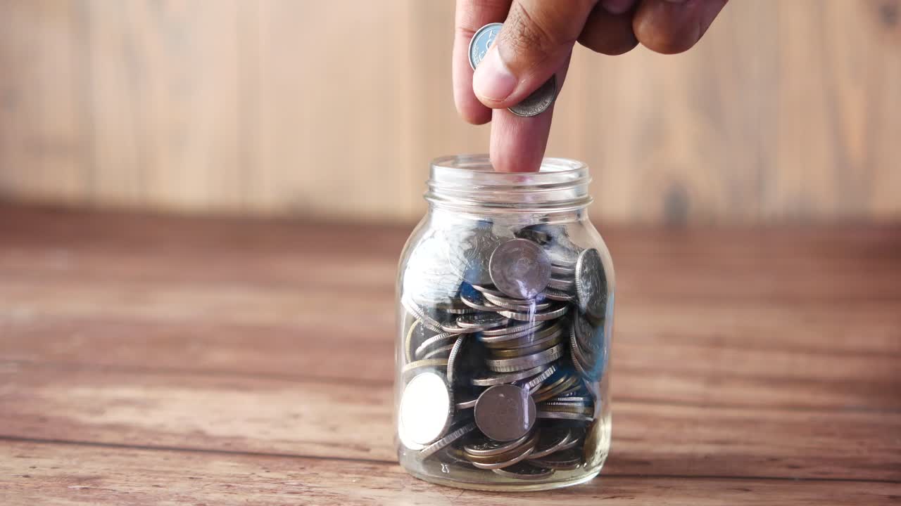 Saving Coins in a Glass Jar