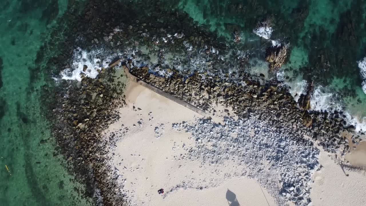Bird-eye aerial along Palmilla Beach in Cabo San Lucas, slice of paradise on the southern tip of the Baja California Peninsula