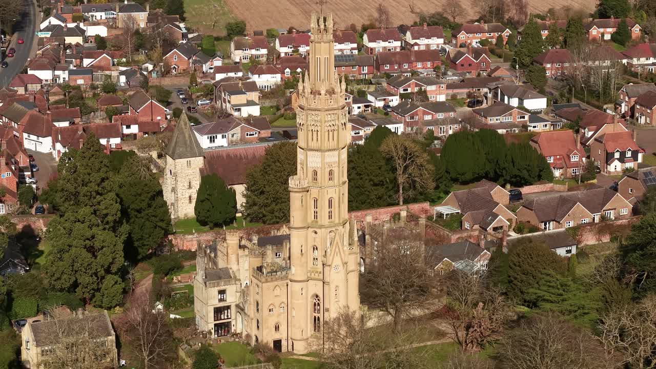 Aerial view of Hadlow Tower, 19th-century Gothic revival landmark on village of Kent, England
