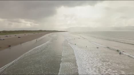 Aerial-beach-shot-of-people-on-a-beach