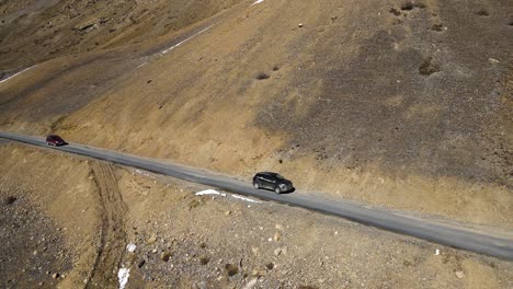 jeep off road car driving on narrowed mountains road in kaza spiti valley himalays