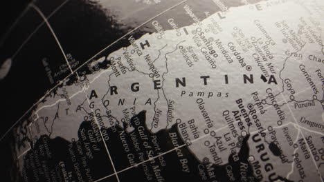 close-up view of argentina on a black and white globe