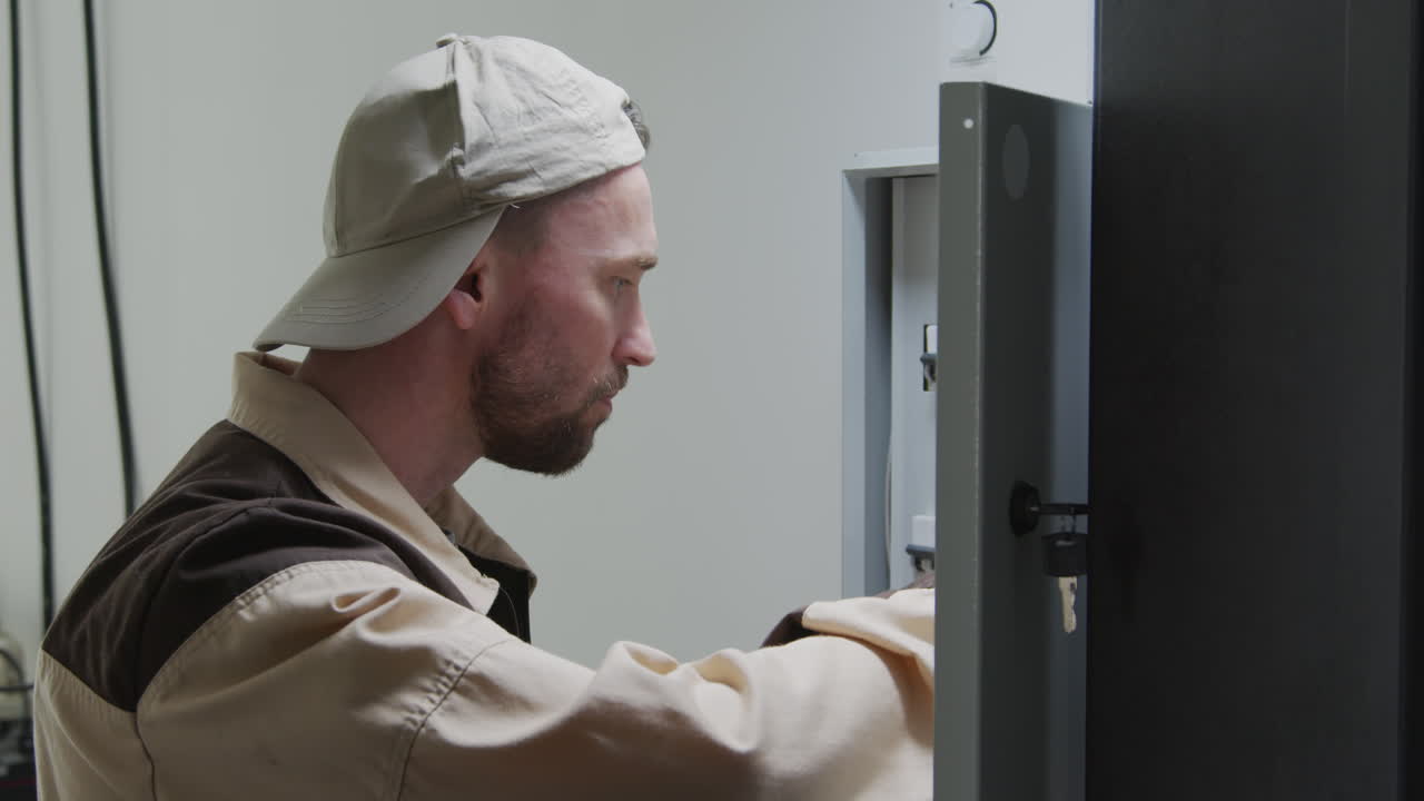 Handymen Checking Electrical Panel and Pipes