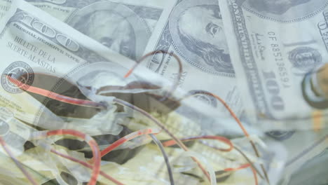 animación de varios billetes girando sobre un médico caucásico chequeando bolsas de sangre