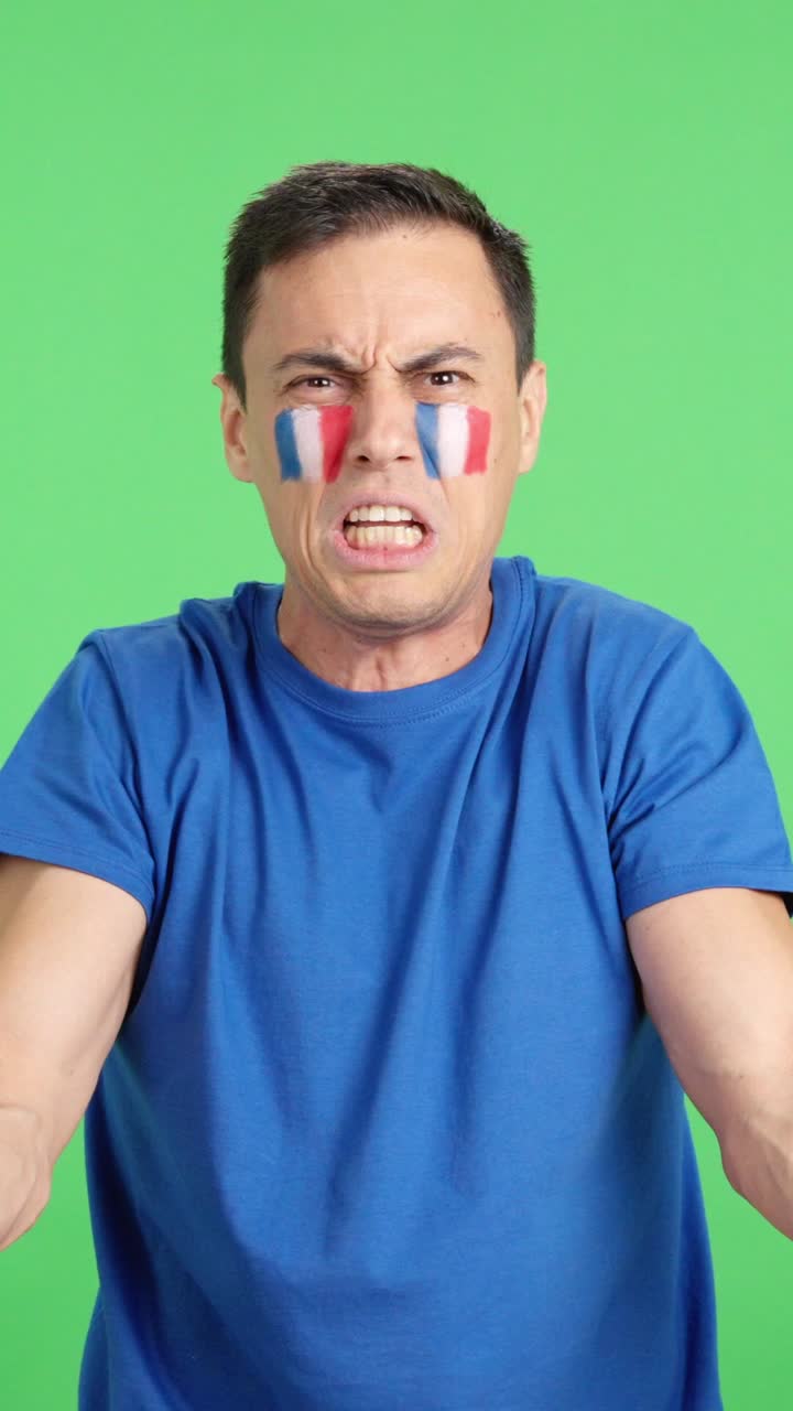 French supporter angry with the decision of the referee