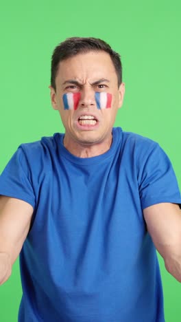 french supporter angry with the decision of the referee