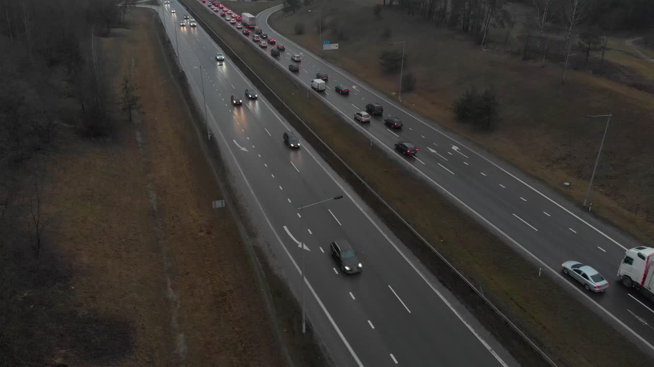 Tilt up view over highway rush hour traffic people driving car or truck to work for the business on time