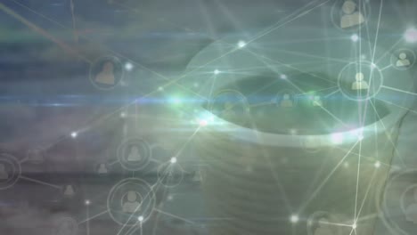 Animation of people icons over cup of coffee and network of connections