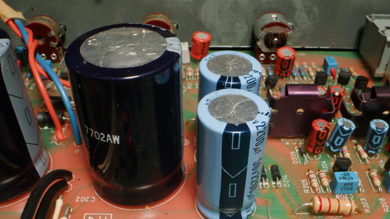 Radio parts of the old amplifier, vintage transistors and chips, hi-fi vintage audio player close up.