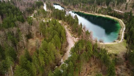 Breathtaking-aerial-shot-of-Austrian-lake-of-Bluntauseen-in-Golling,-flyover