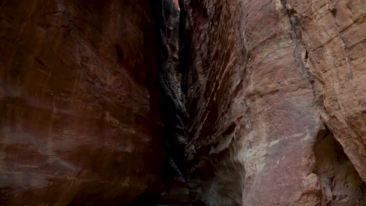 A captivating journey through the towering rock walls of The Siq.