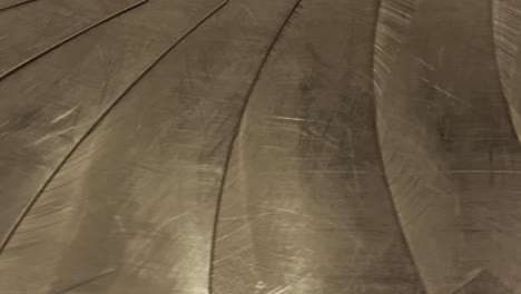 bags and suitcases move along conveyor belt in the baggage reclaim hall at the airport