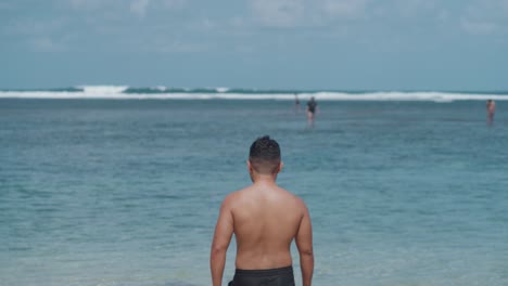 man enjoying a beach walk
