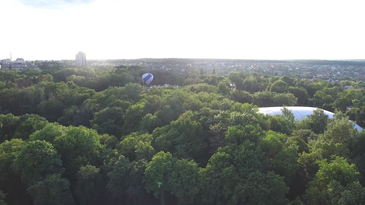 Hot Air Balloons Have Completed Filling Up. Hot air balloons have completed filling up and are ready to make their ascent in the summer