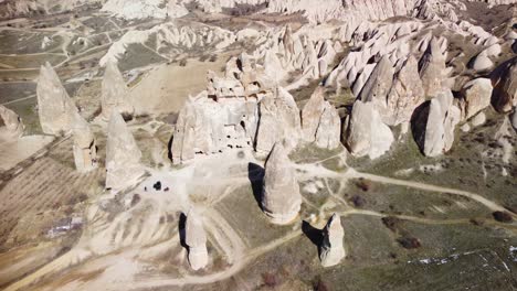 cappadocia turkey's fairy chimneys: geological pillar rock formations formed by erosion