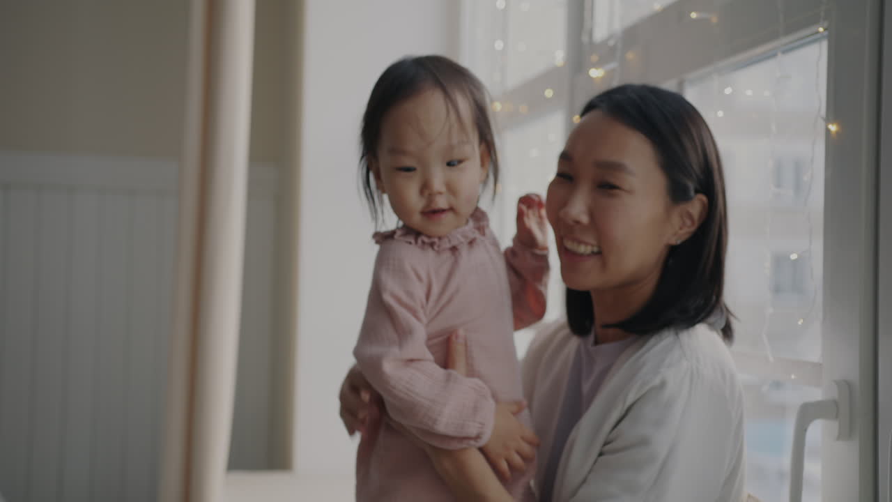 Mother and Baby by Window