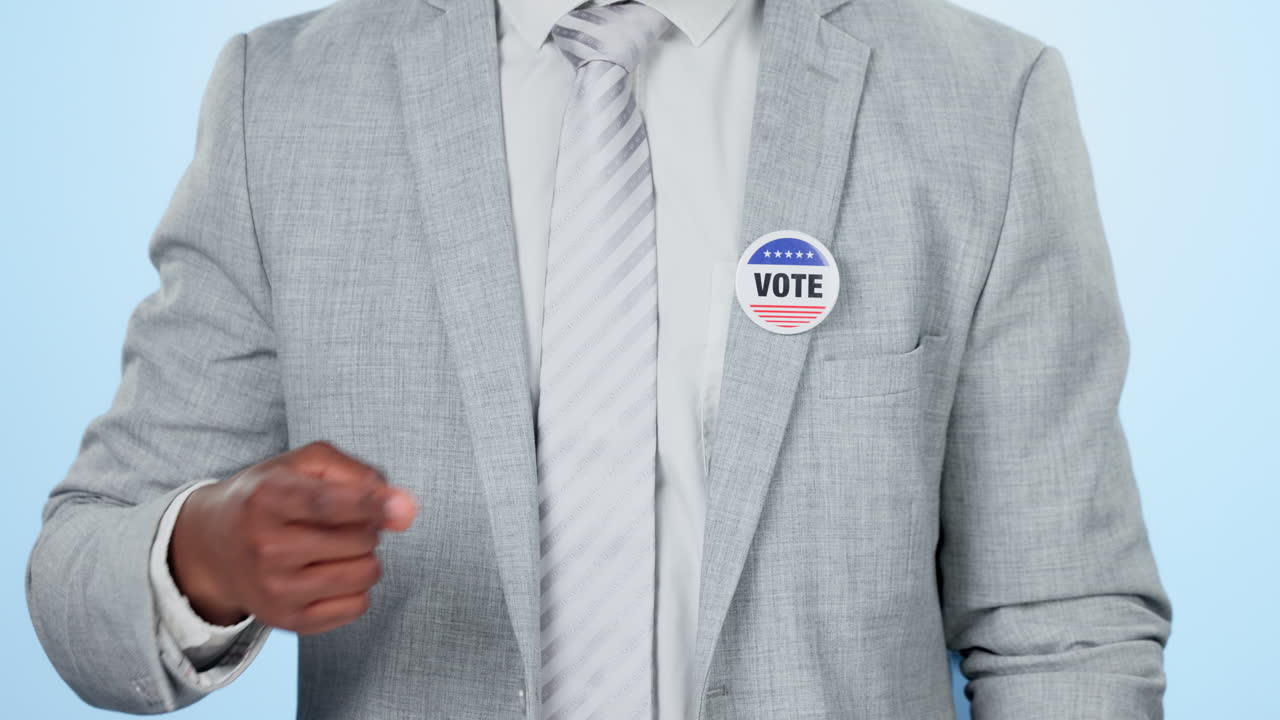 Vote pin, sticker and business man hand in studio