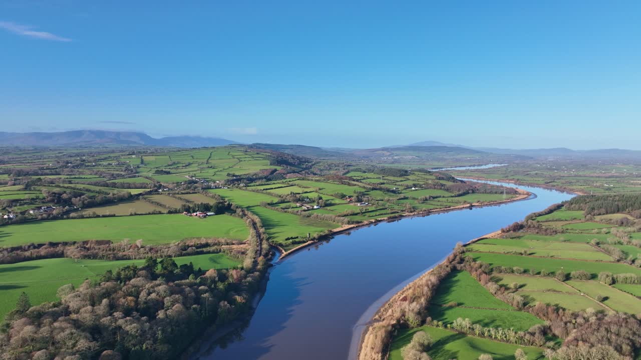 aerial pullback Waterford Ireland Landscape River Suir snakes to the fertile countryside
