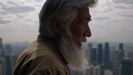 elderly man contemplating cityscape