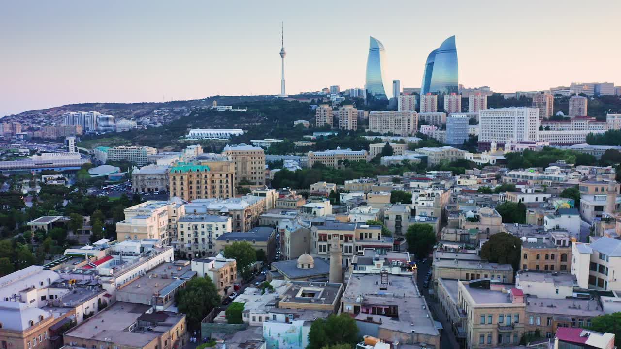 Medieval walled town İ&ccedil;ərişəhər in Baku &ndash; sunset cityscape of Azerbaijan capital city downtown