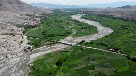 The-Harmonious-Blend-of-Bridge,-River,-and-Nature-in-Laghman-Province