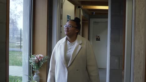 business woman walking happy through the hallway of her business