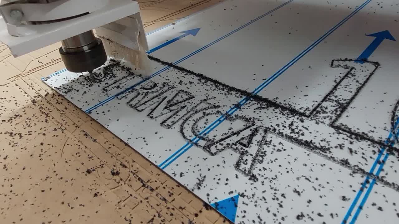 CNC Router engraving text on plastic aluminium sandwich plate