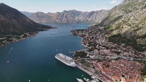 aerial rises over picturesque town of kotor in kotor bay, montenegro