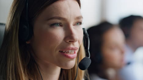 woman specialist talking headset in data center closeup. helpful sales agent