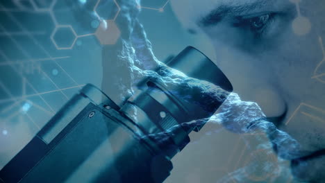 Science Composition Man looking into a microscope combined with animated DNA
