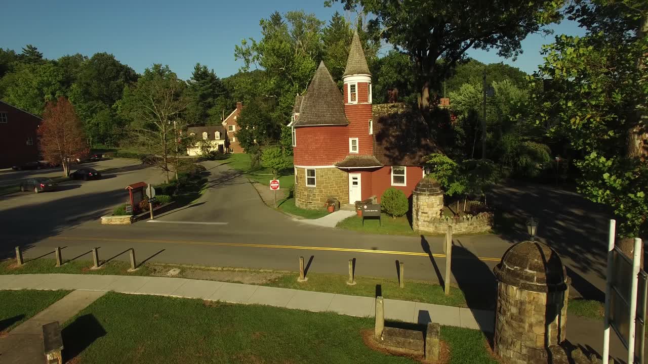 Exterior view of a historic building with tower
