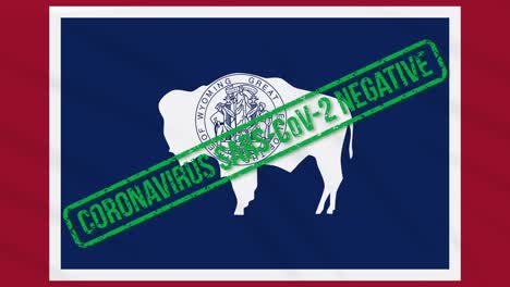 wyoming us state swaying flag with green stamp of freedom from coronavirus, loop