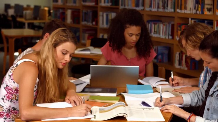 Students working together in the library