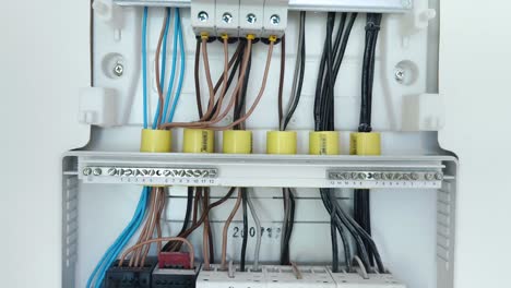 electrical panel wiring and circuit breakers close-up