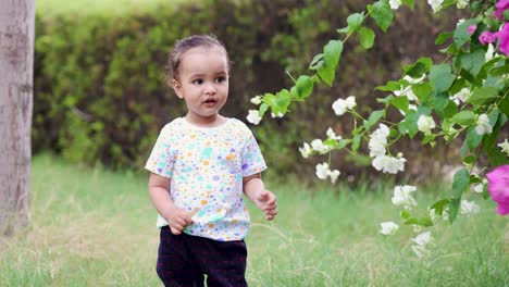 cute toddler standing at outdoor innocent moments at evening