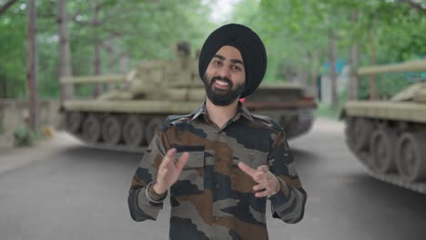 happy sikh indian army man clapping and appreciating