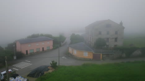 misty rural village scene