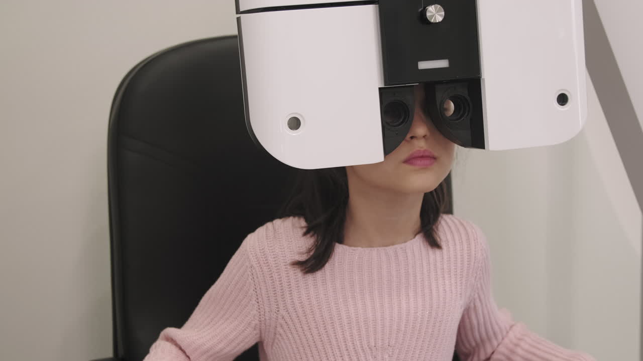 Little Girl Taking Her Eye Test