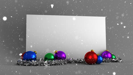 Animation-of-snow-falling-over-white-card-with-copy-space-and-christmas-decorations