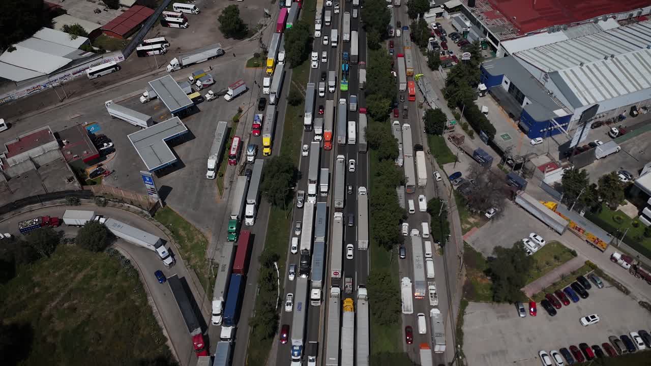 Aerial static drone footage showing heavy traffic congestion on the Mexico–Querétaro Highway within the Mexico City metropolitan area, highlighting urban mobility and transportation density
