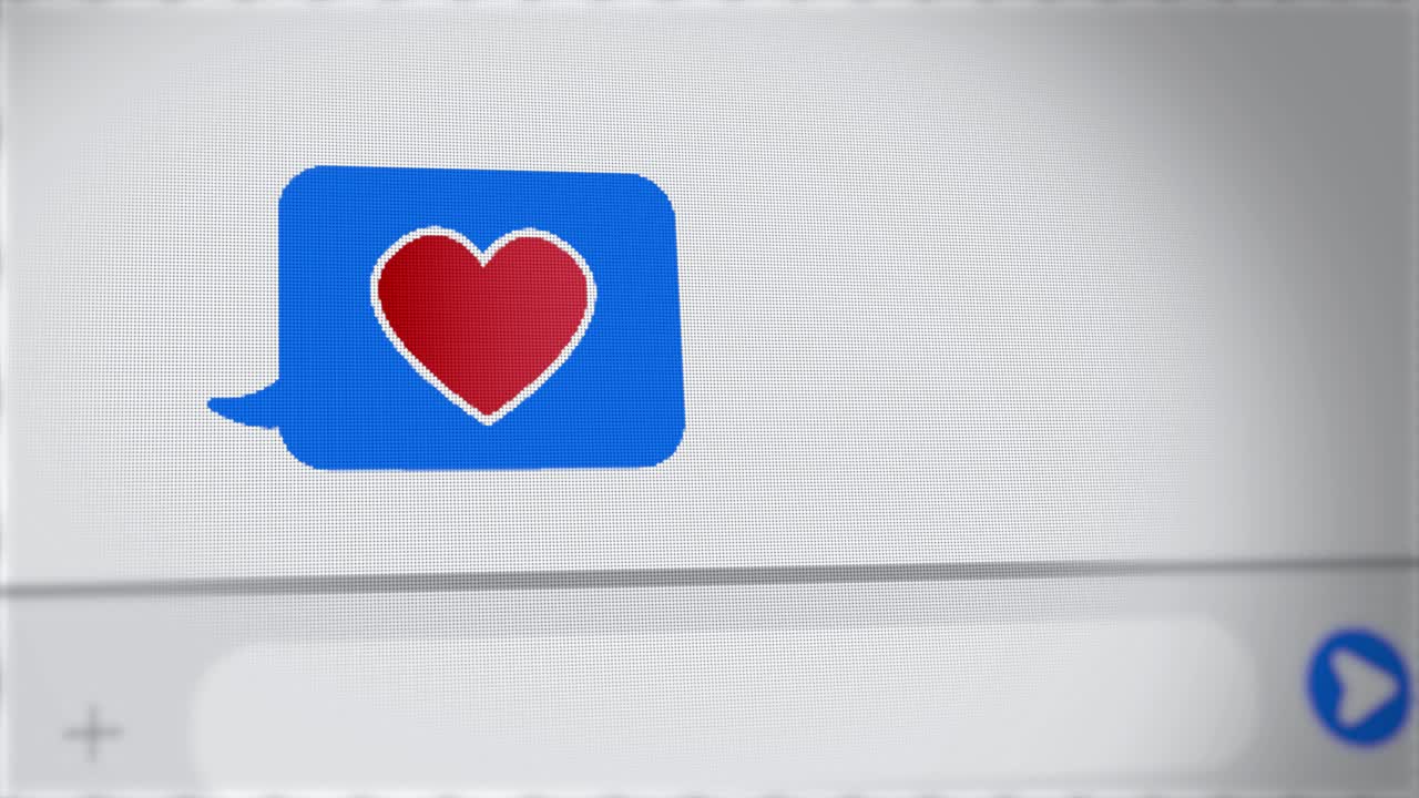 Heart emoji - text message close up on mobile phone chat screen