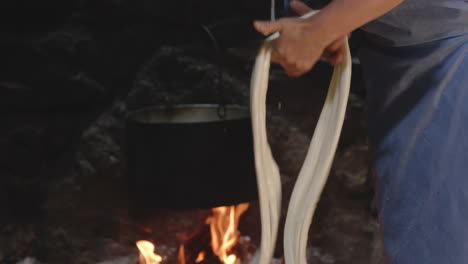 Hand-Stretches-Tenili-Cheese,-Cheese-Making-Process,-Chobareti-Georgia,-Tilt-Down