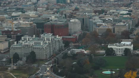 aerial video of white house and eisenhower executive office building on washington, dc city background.