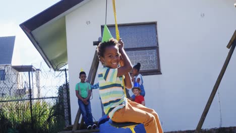 kids swinging in a rope swing 4k