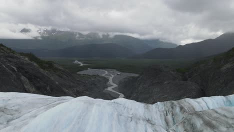 icy glacier with mountain range