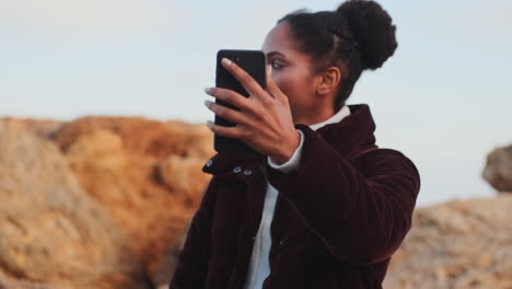 African-American-girl-having-a-video-call-outdoors.