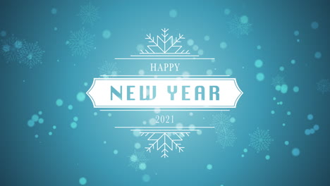 Animated-closeup-Happy-New-Year-and-2021-text-white-snowflake-and-glitter-on-snow-blue-background