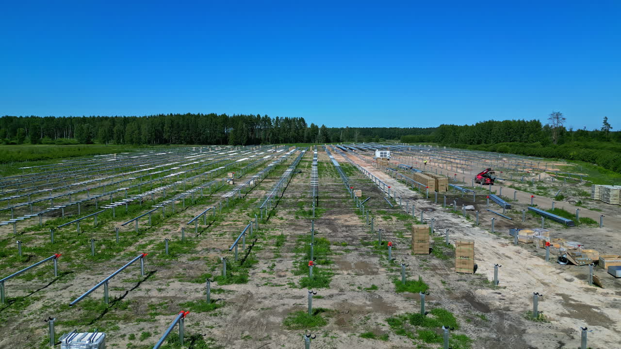 Ground preparation for the installation of solar panels in a park. Drone shot